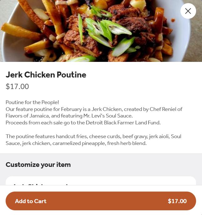 Jerk Chicken Poutine featuring MyT Fine Soul Sauce at Brooklyn Street Local