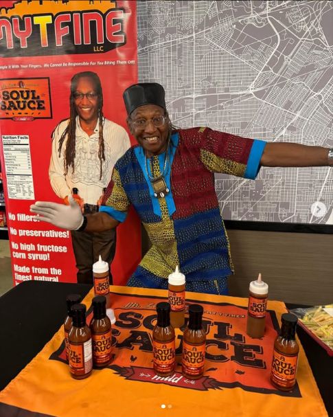 Mr. Levi Johnson Jr. displaying MyT Fine Soul Sauce at Detroit Food Co-Op
