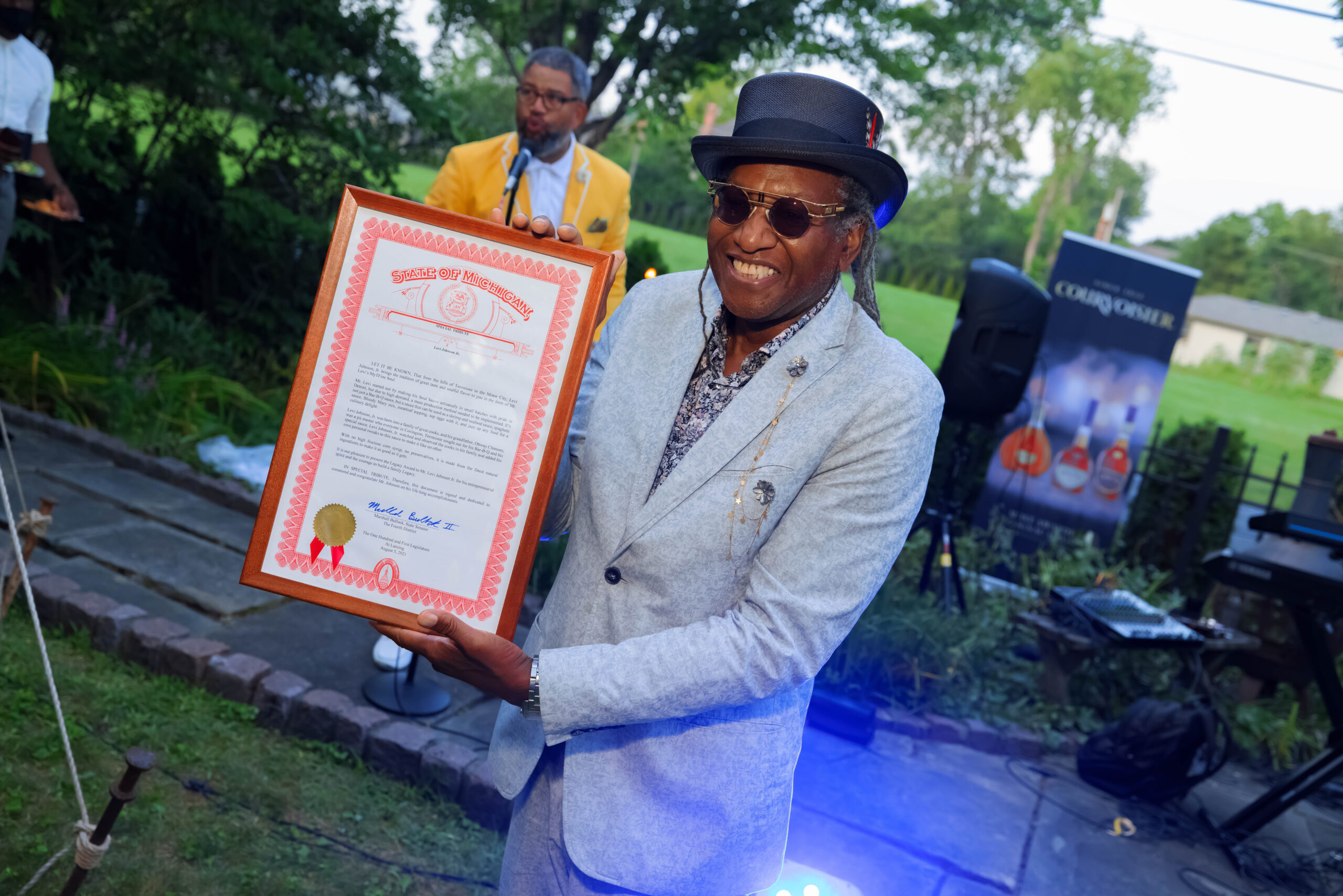 Soul Sauce founder Levi Johnson receiving Legacy and Entrepreneurship Award of Excellence - Polo Classic
